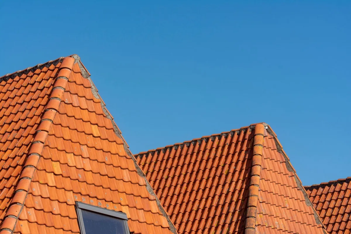 Clay barrel tile rooflines on homes in Waukegan, IL
