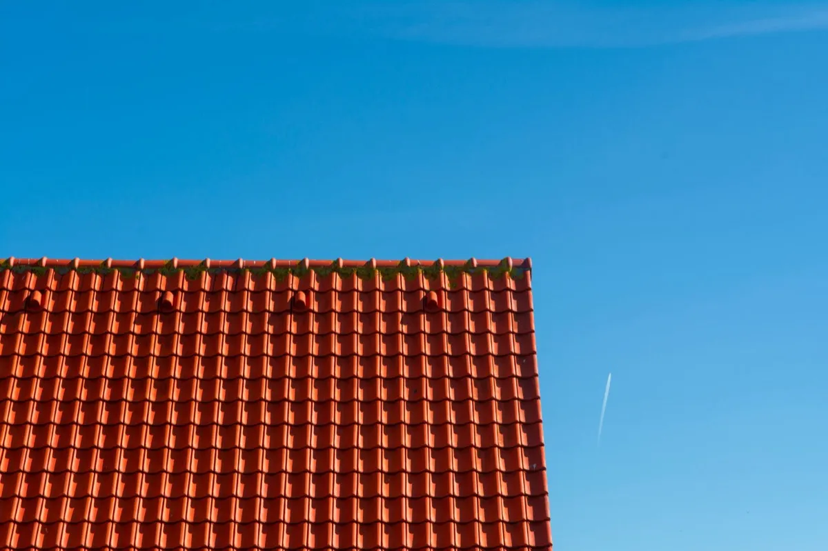 Tile roof gable in full sun, the kind of exposure that sets roof life in Waukegan, IL